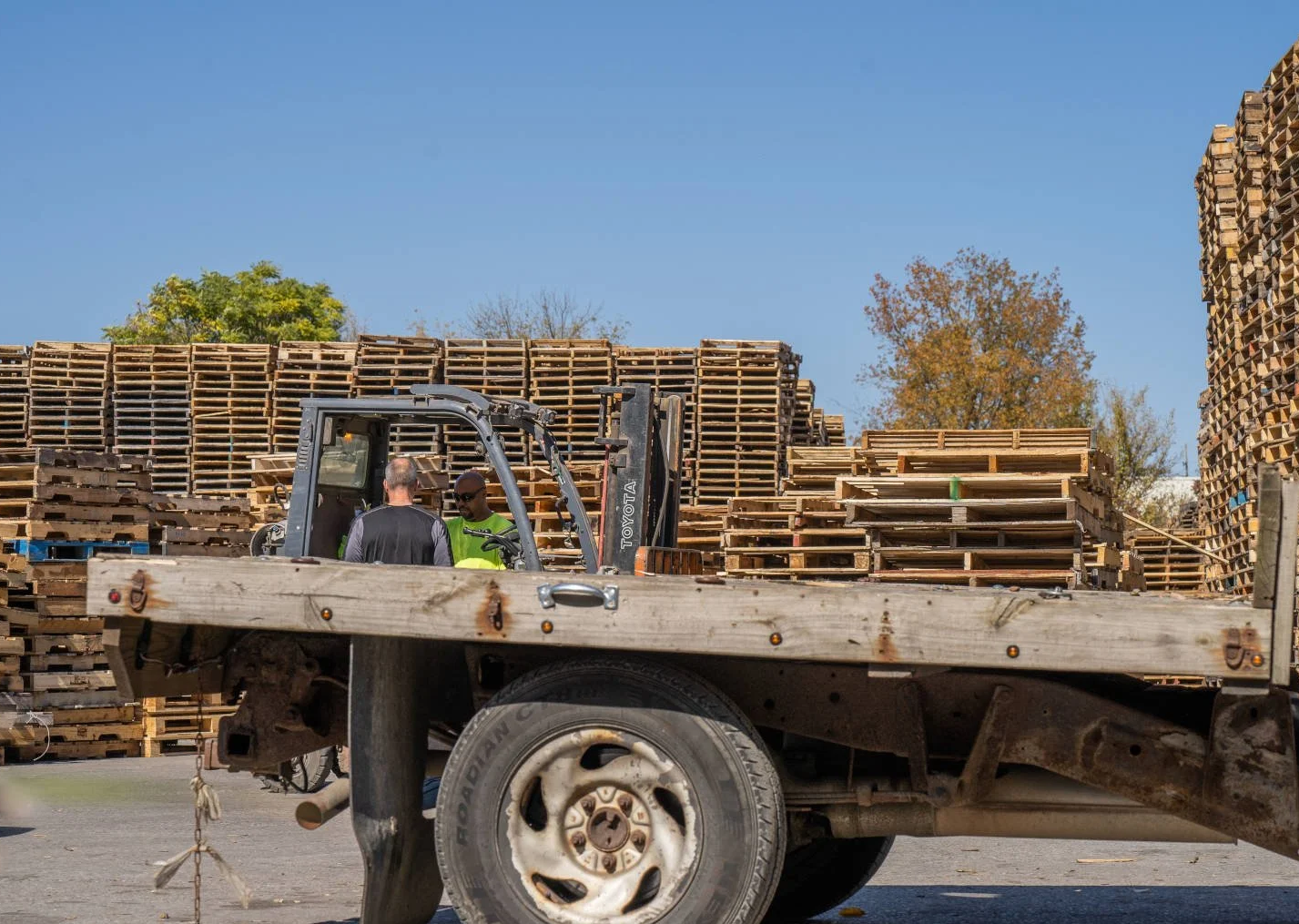 Pallet jockey unloading at the Tri County Pallet yard